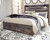 Drystan Brown / Beige King Panel Bed With 2 Storage Drawers