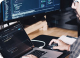 Developer coding at desk