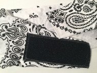 this is an example of our NO KNOT NO TIE backside closure option.  If you want this added to the back of this sassy bandana, then simply click the options box.