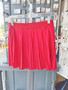 Pleated ruby mini skirt