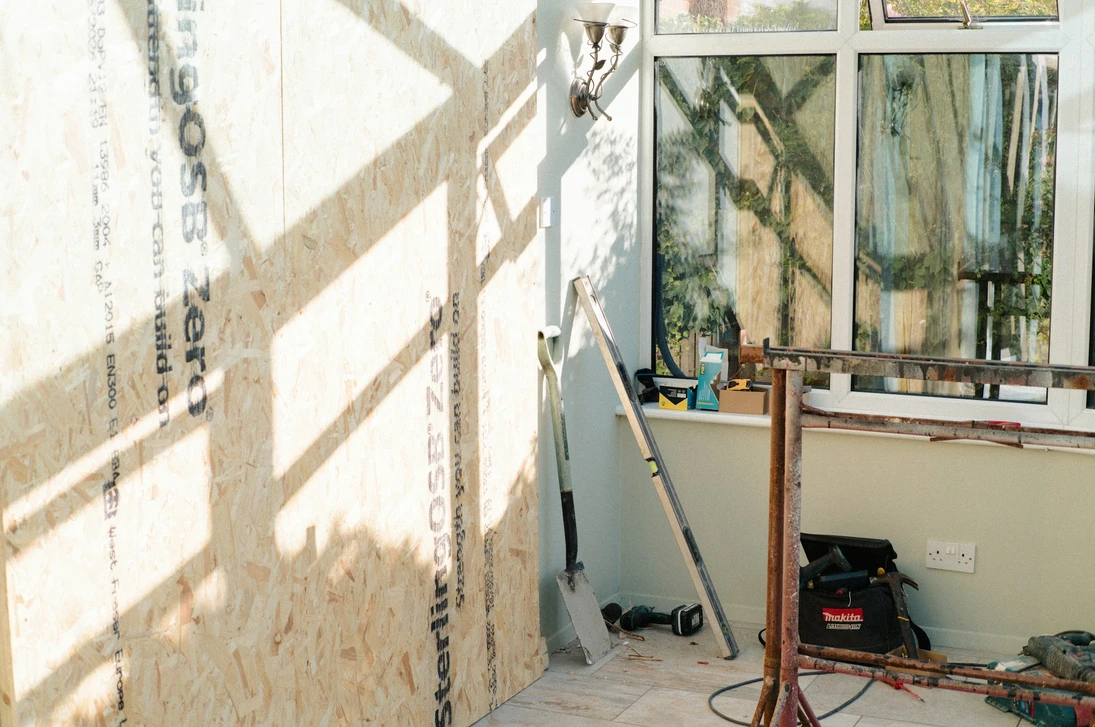 How to Remove Blown-In Insulation From Walls: Access Holes or Open Drywall