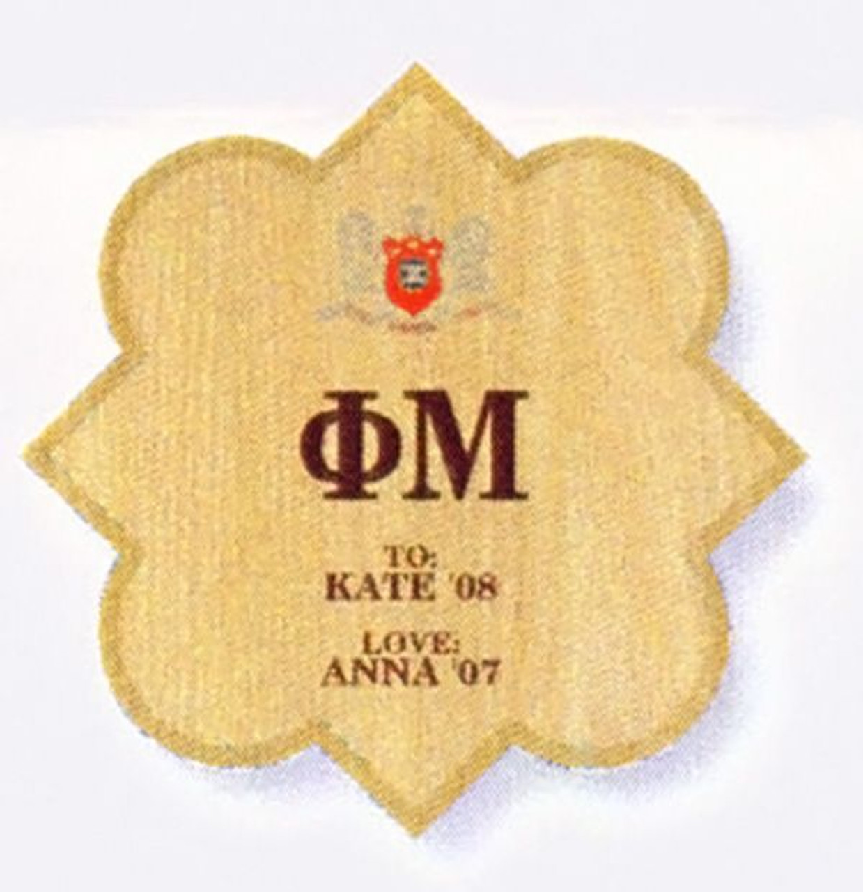 phi mu quatrefoil symbol