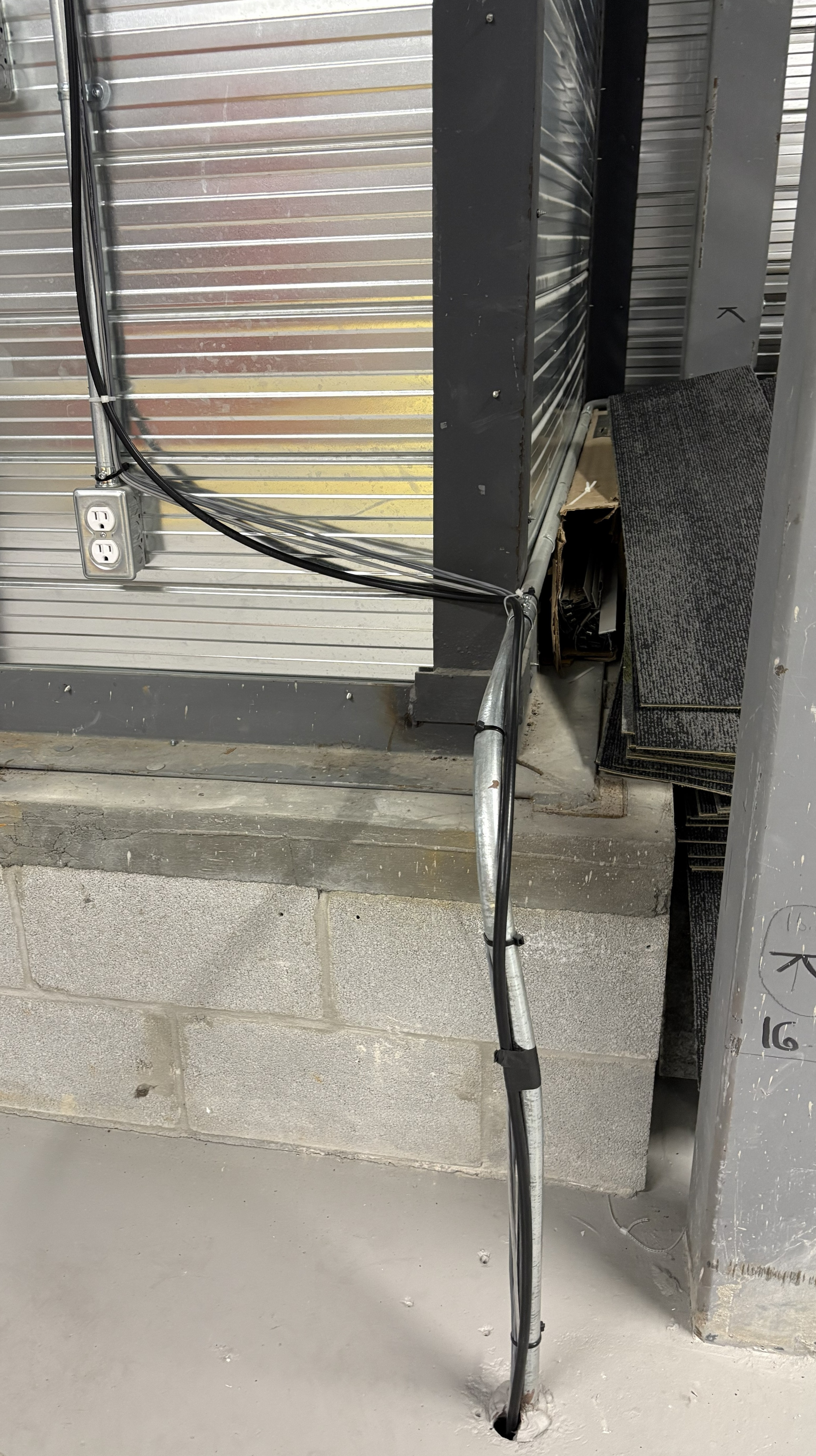 Cable route from the roof into the building's lower level