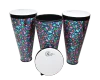 Toca Sympatico Nesting Ashiko 3-pack in Autumn Days finish with removable pretuned fiber heads displayed for classroom and drum circle use