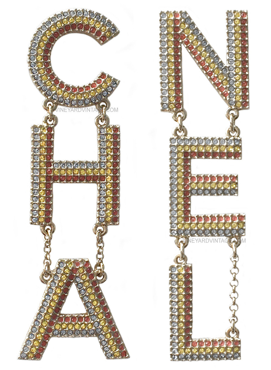 CHANEL ULTRA RARE CRUISE 2023 RAINBOW CRYSTAL LETTER EARRINGS