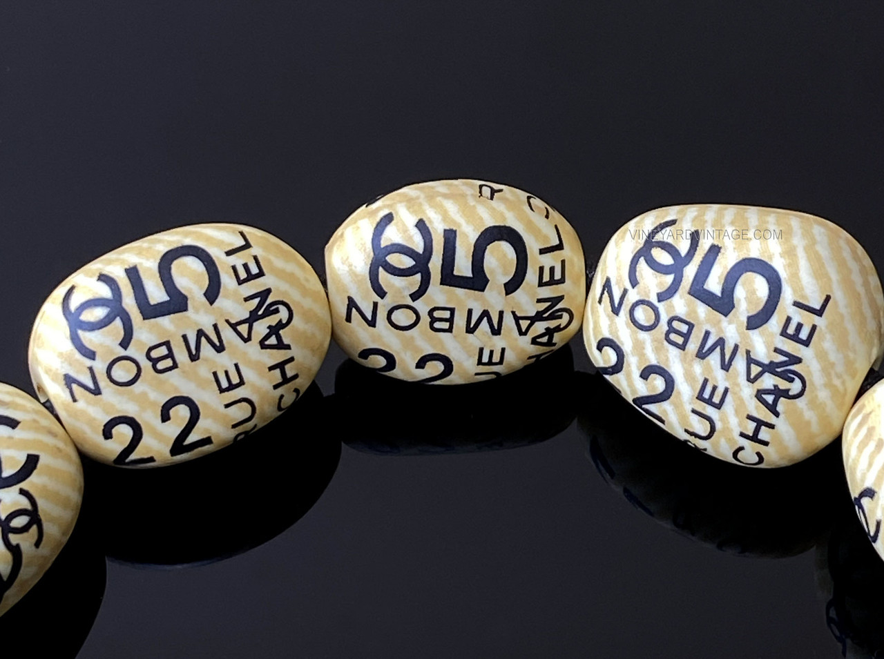 CHANEL STRETCHY GRAFFITI PATTERNED BEADED BRACELET