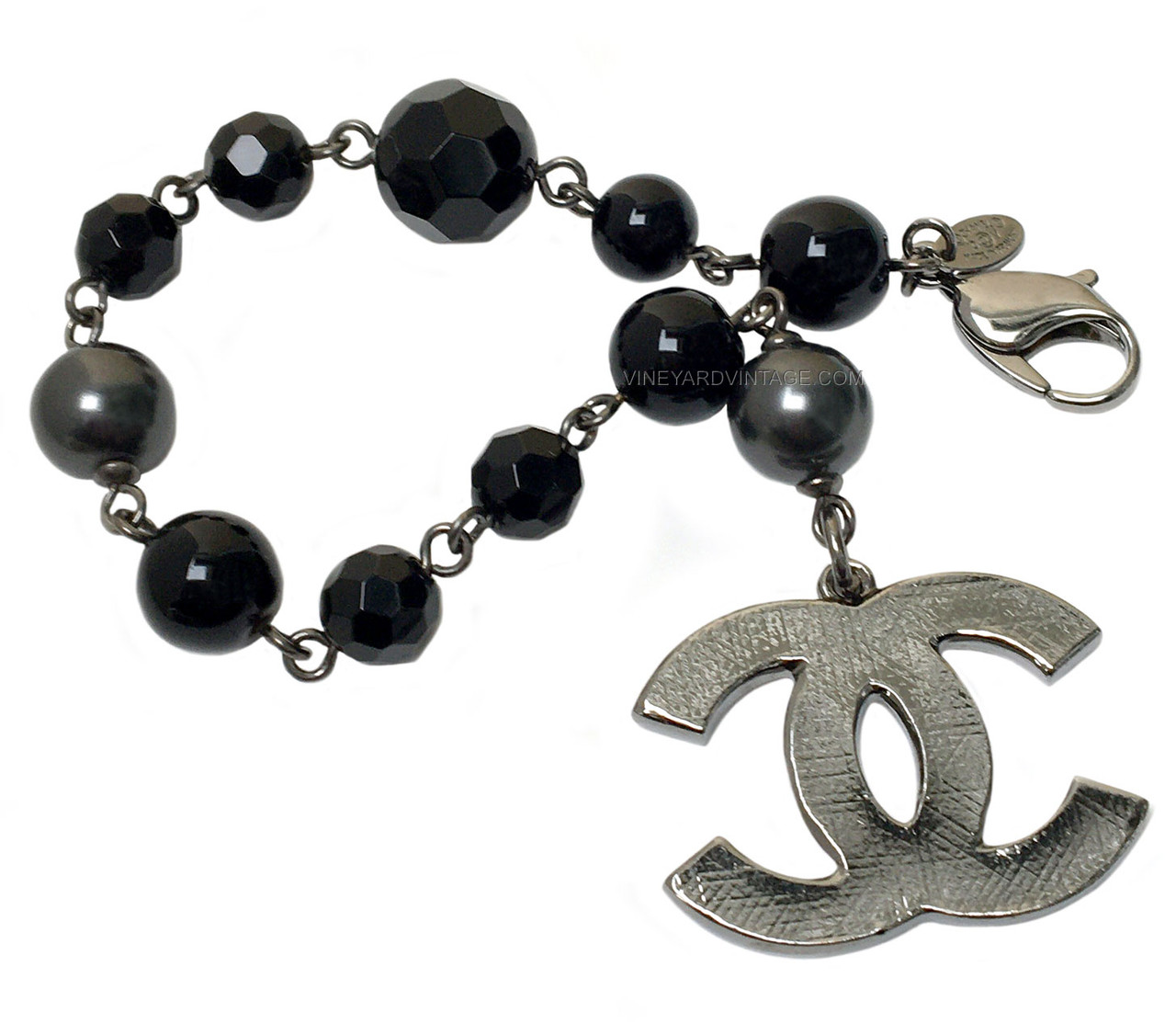 CHANEL BEAD, PEARL & LARGE ETCHED CC LOGO BRACELET
