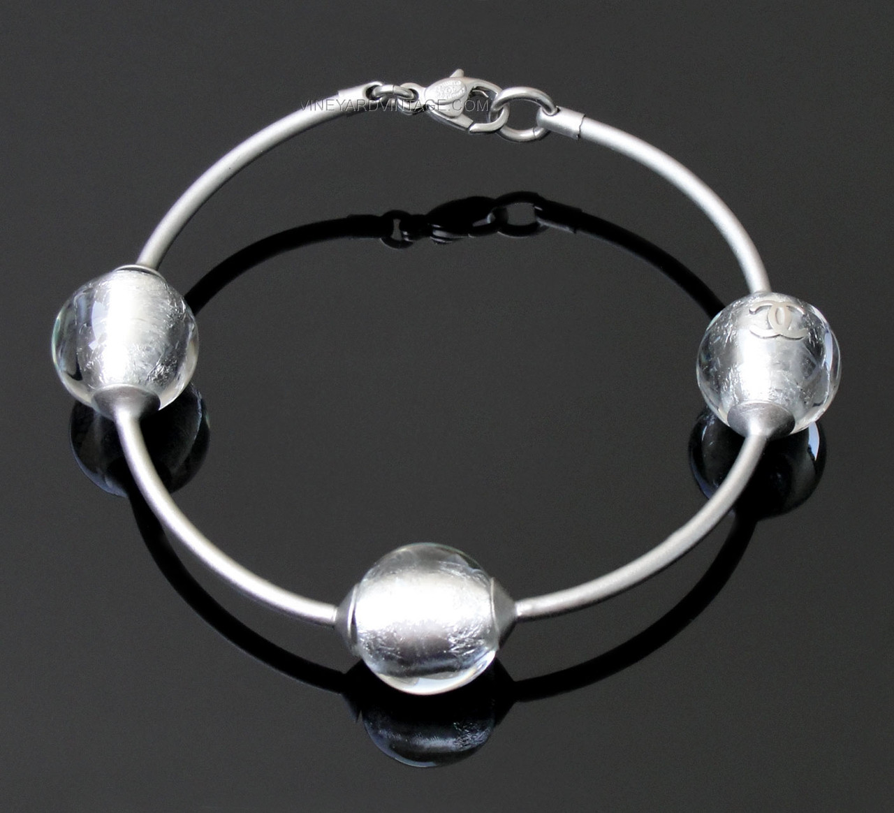 CHANEL VINTAGE GLASS ORB AND CC LOGO BANGLE BRACELET