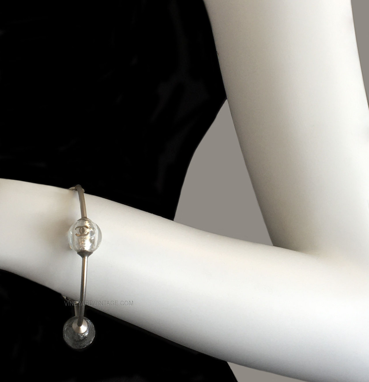 CHANEL VINTAGE GLASS ORB AND CC LOGO BANGLE BRACELET