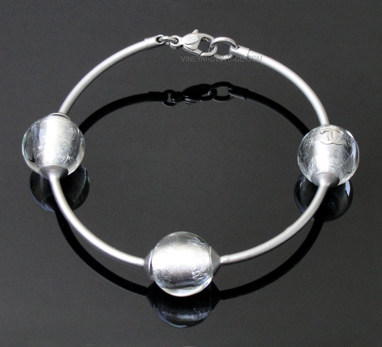 CHANEL VINTAGE GLASS ORB AND CC LOGO BANGLE BRACELET
