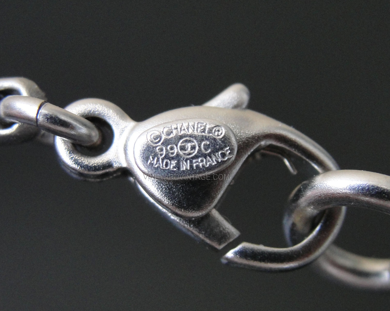 CHANEL VINTAGE GLASS ORB AND CC LOGO BANGLE BRACELET