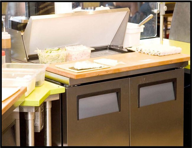True refrigerated prep table in kitchen