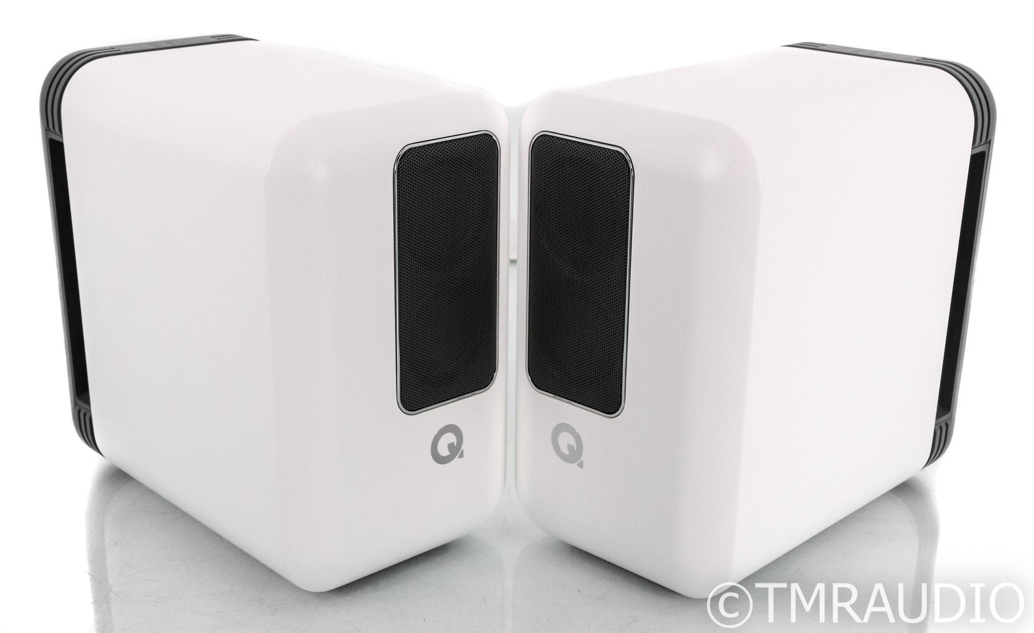 white powered bookshelf speakers