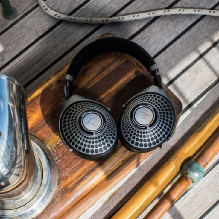 Focal Bathys Wireless Noise-Cancelling Headphones lifestyle shot, on boat deck