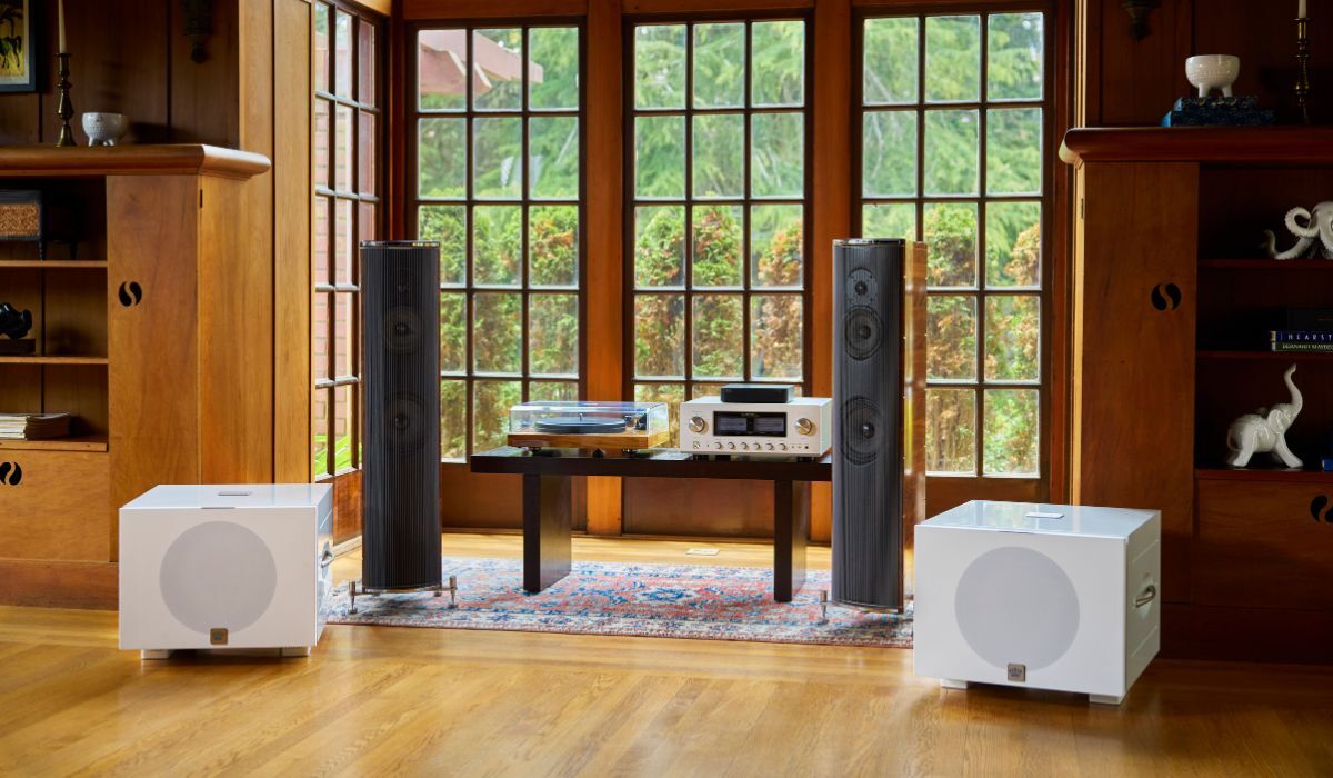 REL S850 10" Powered Subwoofer, white pair in elegant living room listening room