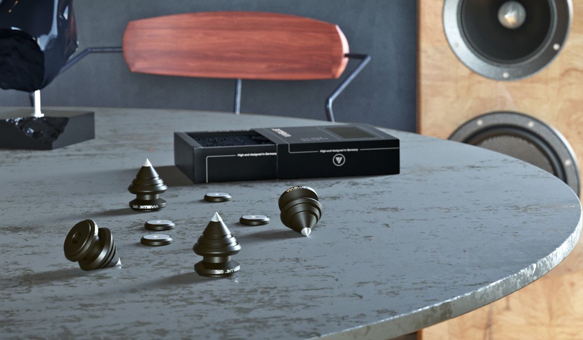 VIABLUE QTC Spikes, Set of 4 on table in listening room, lifestyle shot