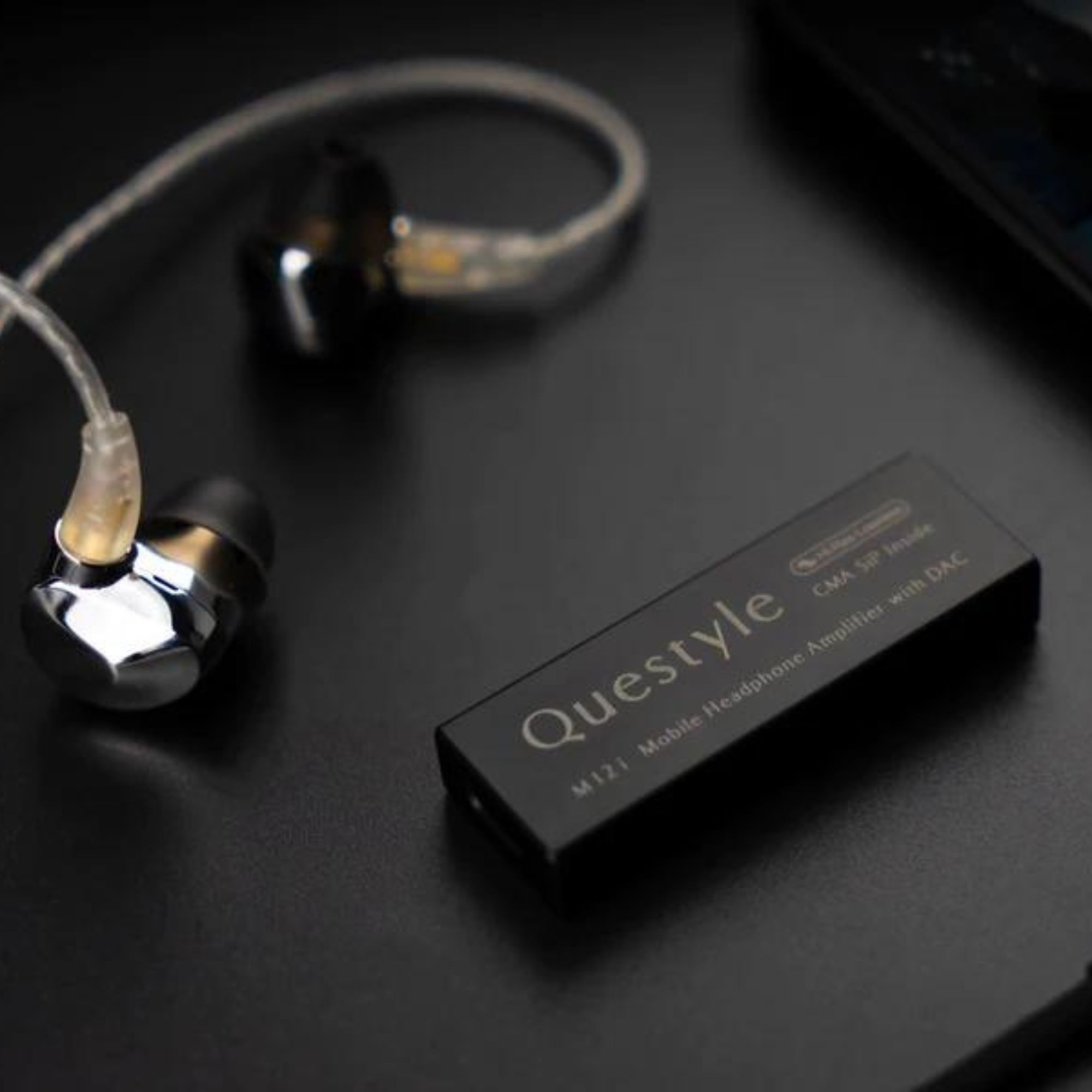 Questyle M12i Headphone Amplifier with headphones