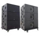 Stacked Admark AD-728A subwoofers on wheels