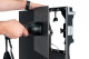 Removing an LED module with a magnetic tool.
