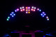 Arch of stage lights with white lenses.