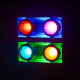Four multicolored stage lights.