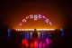 Arch of multicolored stage lights.