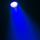 Blue light beam from stage fixture.