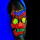 Fluorescent sugar skull body paint.