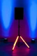 Speaker on a glowing orange LED stand.