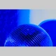 EM12 A blue-lit, mirrored disco ball.