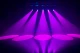 ADJ Focus Spot 5Z beams glow purple.