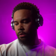 Man wearing AlphaTheta HDJ-F9 headphones
