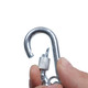Hand holding broken metal carabiner
