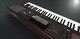 Korg PA1000 61-Key PRO Arranger Light Weight Keyboard + Konig & Meyer 18860 Red Stand