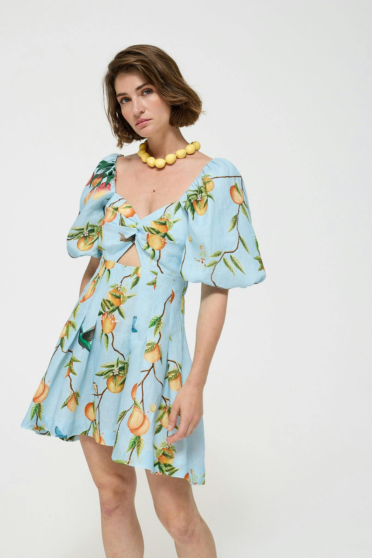 Sweetheart linen empire-waist dress with pleated A-line skirt