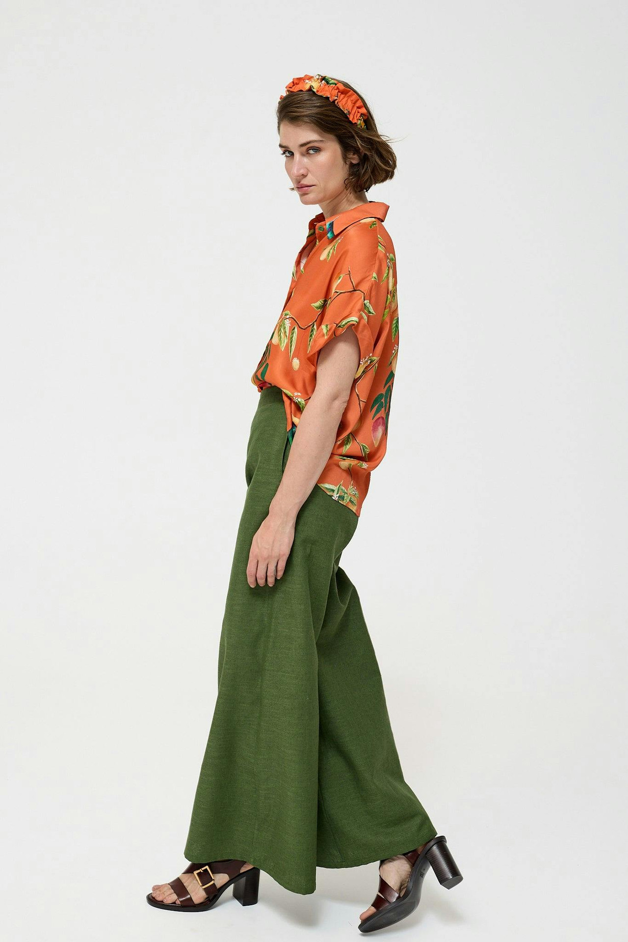Oversized organic cotton button-down blouse with cap sleeves