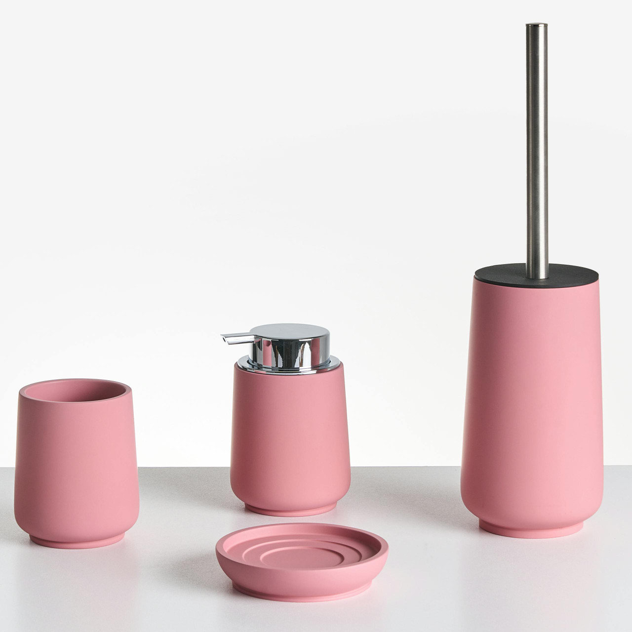 Conjunto de acessórios de casa de banho em poliresina modelo Suches rosa