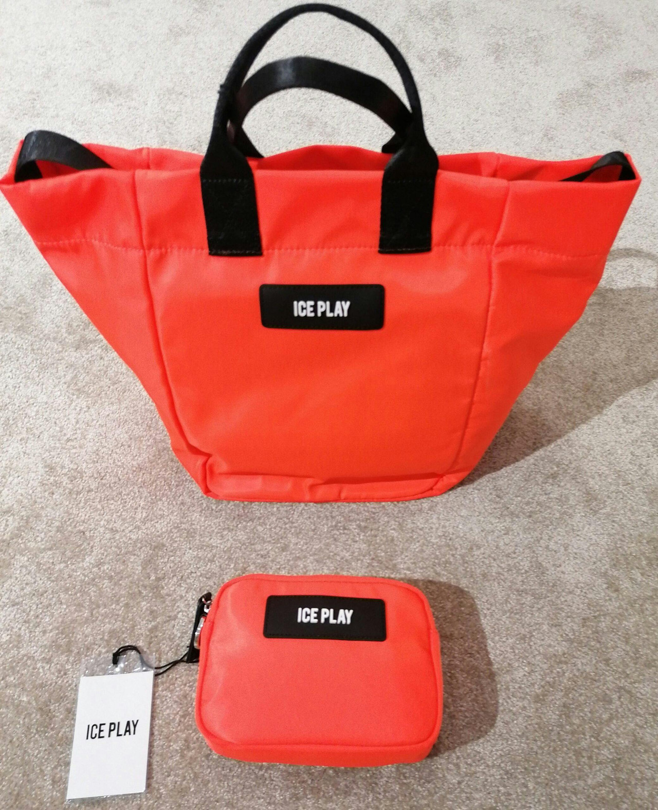 Bolsa de mão em tecido impermeável