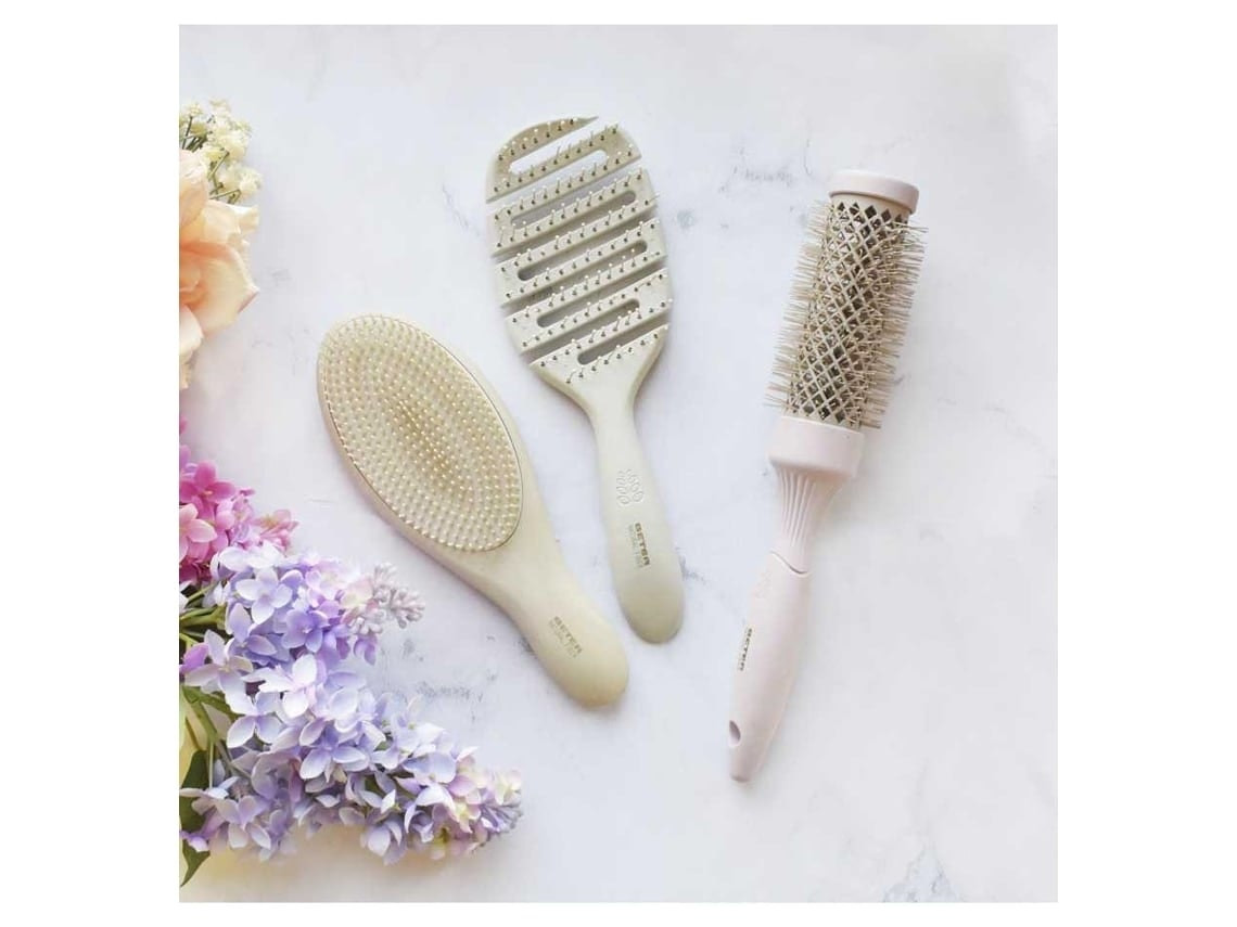 Ventilated hair brush with natural fibers and flexible handle