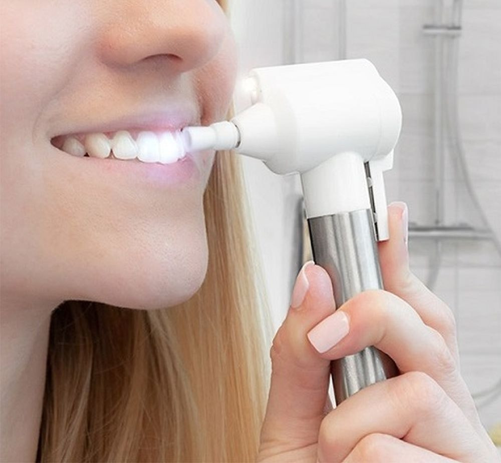 Pulidor y blanqueador dental eléctrico
