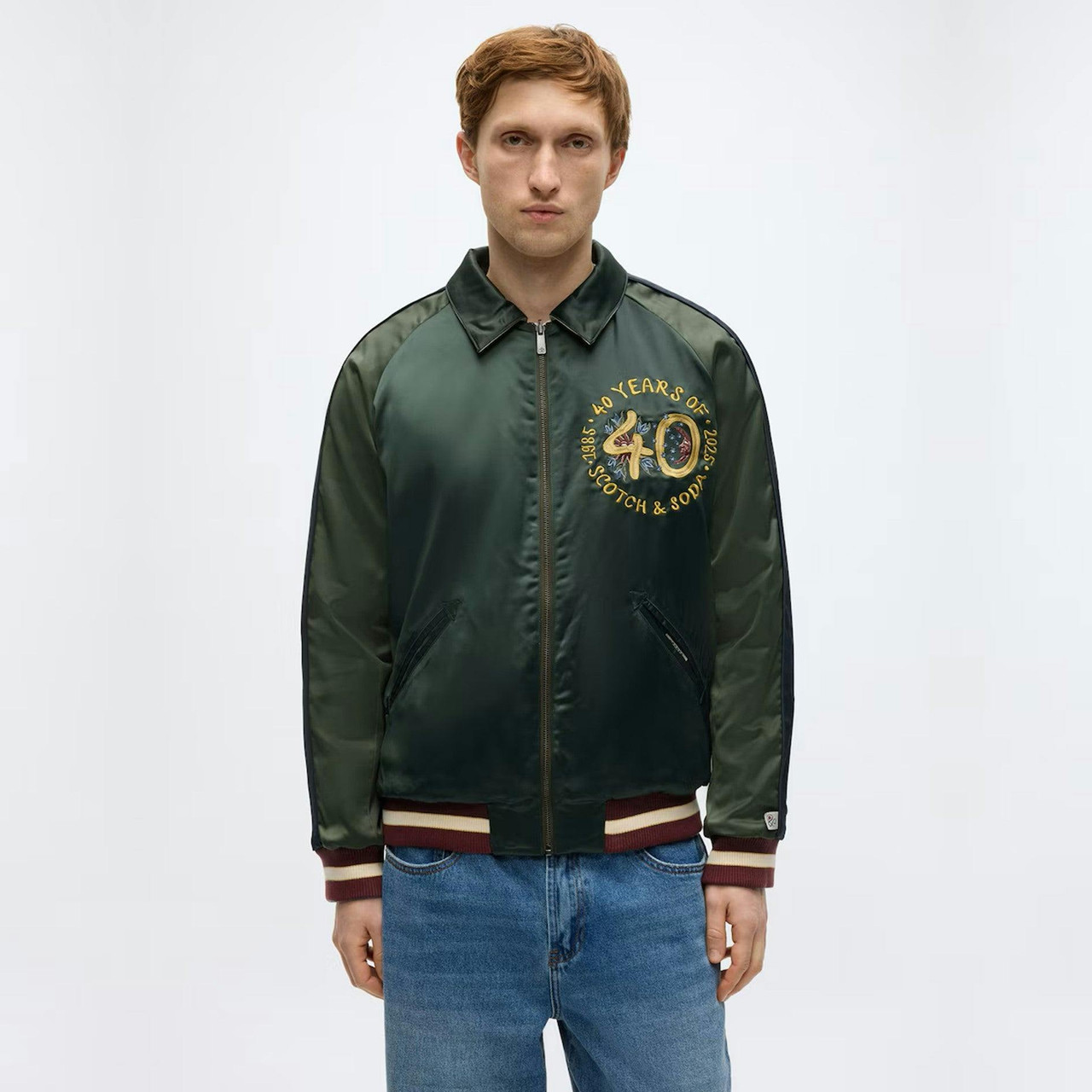 Chaqueta bomber reversible con detalles bordados