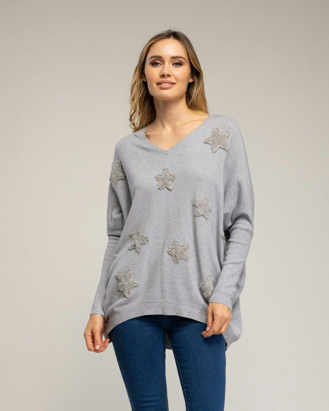 Long oversize knit sweater with stars and rhinestones