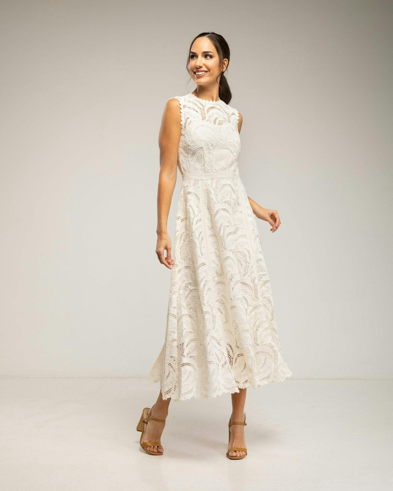 Midi lace dress with flared skirt and waist cut