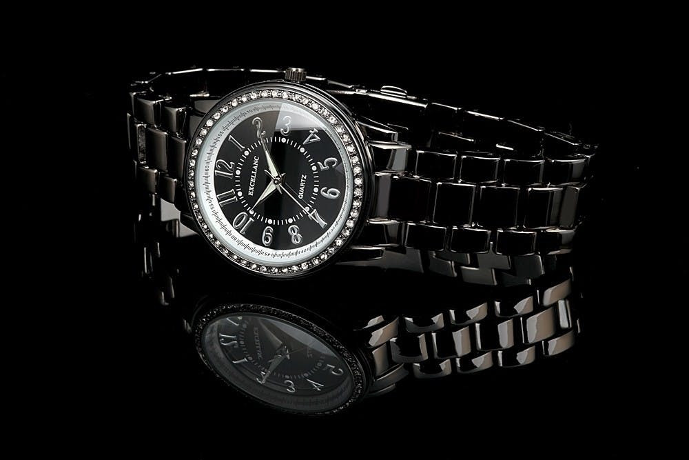Excellanc women's analog metal bracelet watch with crystal details