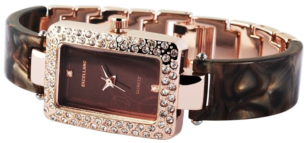 Reloj analógico de metal para mujer con detalle en cristal