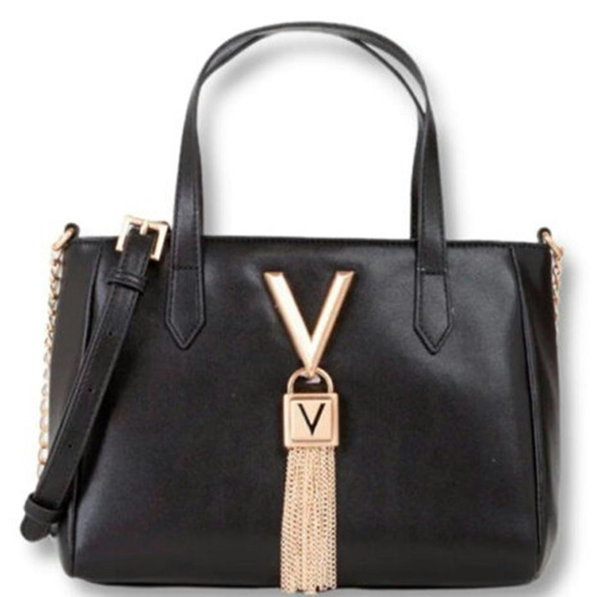 Black handbag with adjustable shoulder strap and zip closure