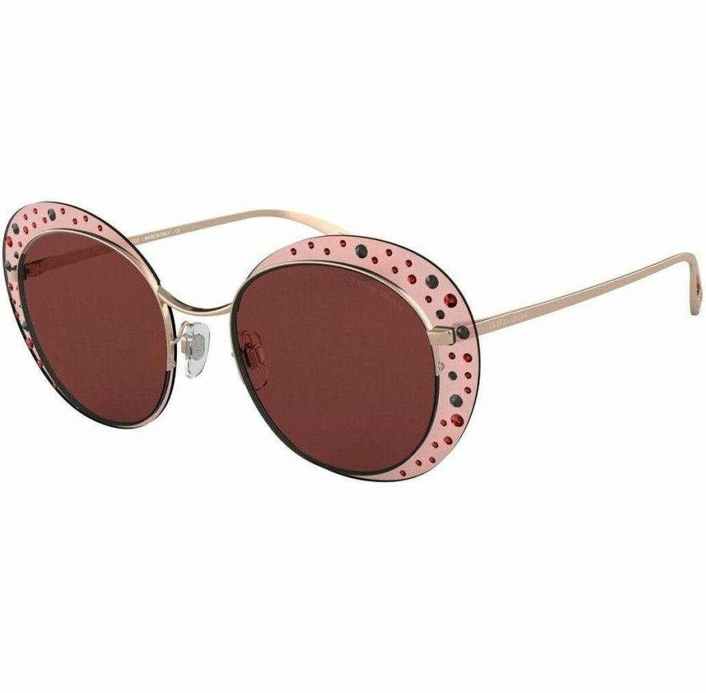 Gafas de sol metálicas doradas con lentes rosas UV400
