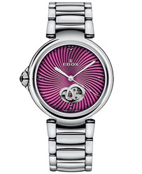 Relógio automático Edox Swiss modelo LaPassion Open Heart com caixa e bracelete em aço inoxidável com acabamento rosé gold. Mostrador prateado em vidro de safira. Movimento automático com horas, minutos e segundos. Resistência à água de 5 ATM. Fecho de implantação. Inclui caixa, documentação e garantia de 3 anos. Marca: Edox Swiss.