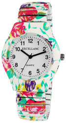 Relógio feminino Excellanc com bracelete metálica multicolor e caixa em aço inoxidável de 35 mm. Movimento de quartzo japonês PC21, fundo em aço inoxidável e vidro mineral. Largura da bracelete 18 mm; comprimento total 19 cm. Padrões disponíveis: florais, borboletas e abstratos. Marca: Excellanc.