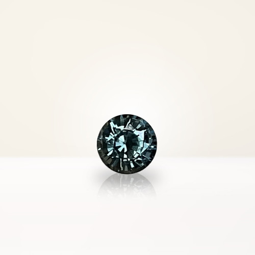 0.63 ct Round Teal Sapphire - Nolan and Vada